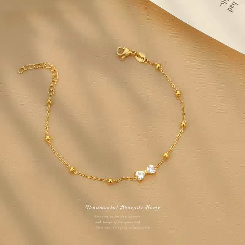 SJ 393 bow heart zircon bead bracelet - 18k Gold PVD plated stainless steel - Anti tarnish