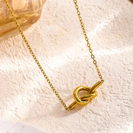 SJ 352 Dainty Knot Necklace - 18k gold plated stainless steel - Anti tarnish - Wholesale