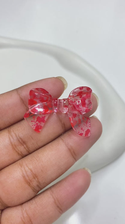 BBB 133 (I)  Bow colour splashed uv plated Acrylic bead ( 1 pc )