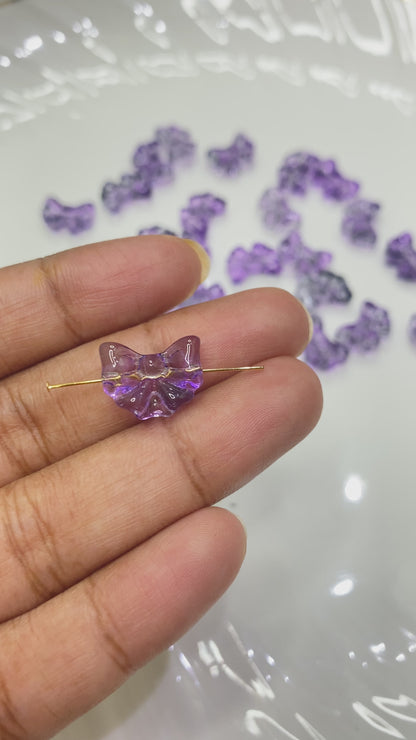 GB 906 Deep purple bow glass bead- per piece