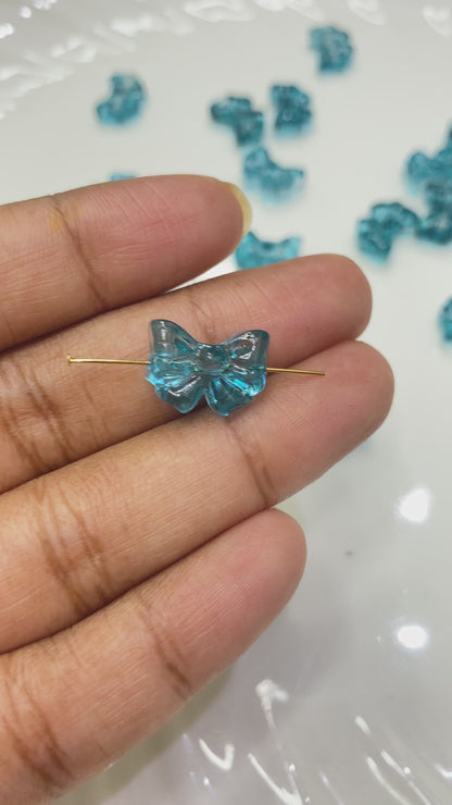 GB 908 sea blue bow glass beads - per piece