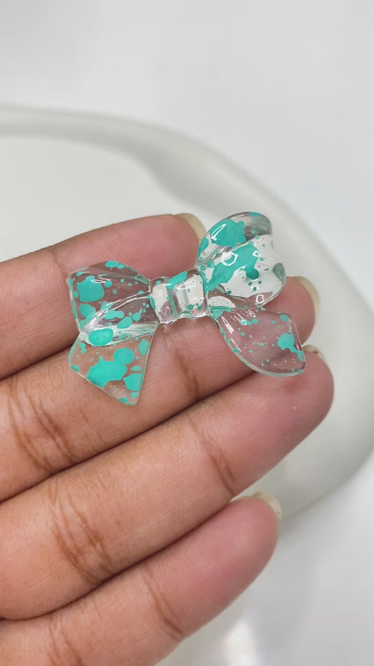 BBB 133 (G)  Bow colour splashed uv plated Acrylic bead ( 1 pc )