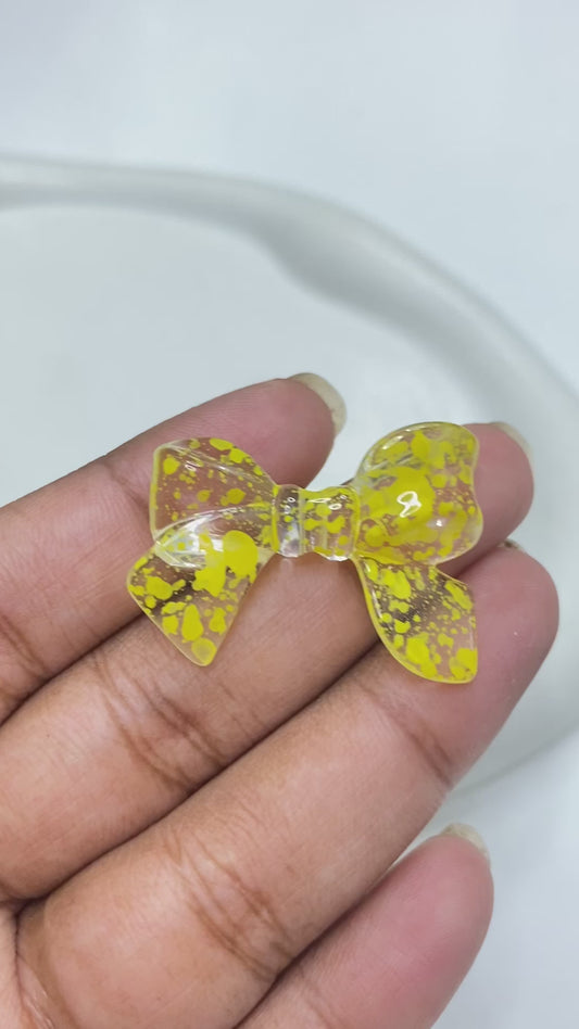 BBB 133 (C) Bow colour splashed uv plated Acrylic bead ( 1 pc )