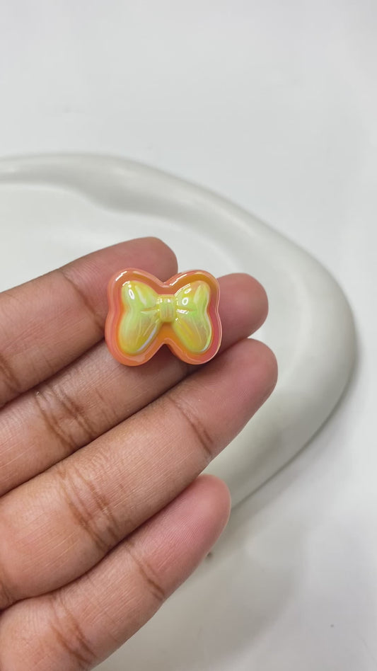 BBB 125 (B) Bow uv plated shiny irrediscent Acrylic bead (1PC)
