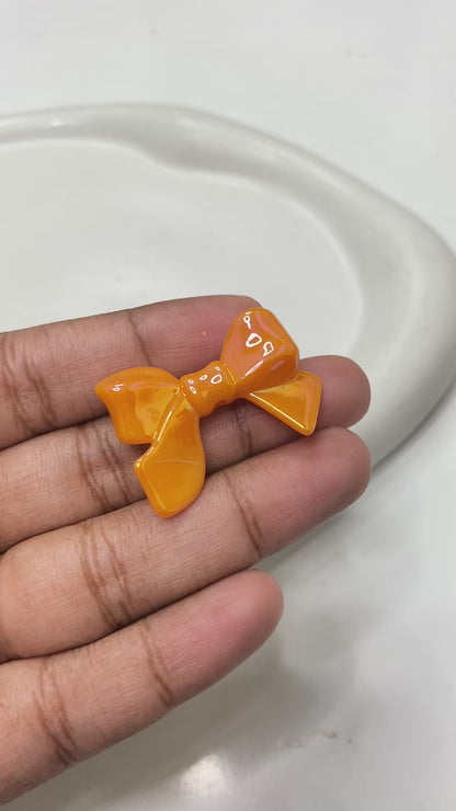 BBB 124 (J) Bow uv plated shiny irrediscent Acrylic bead (1PC)